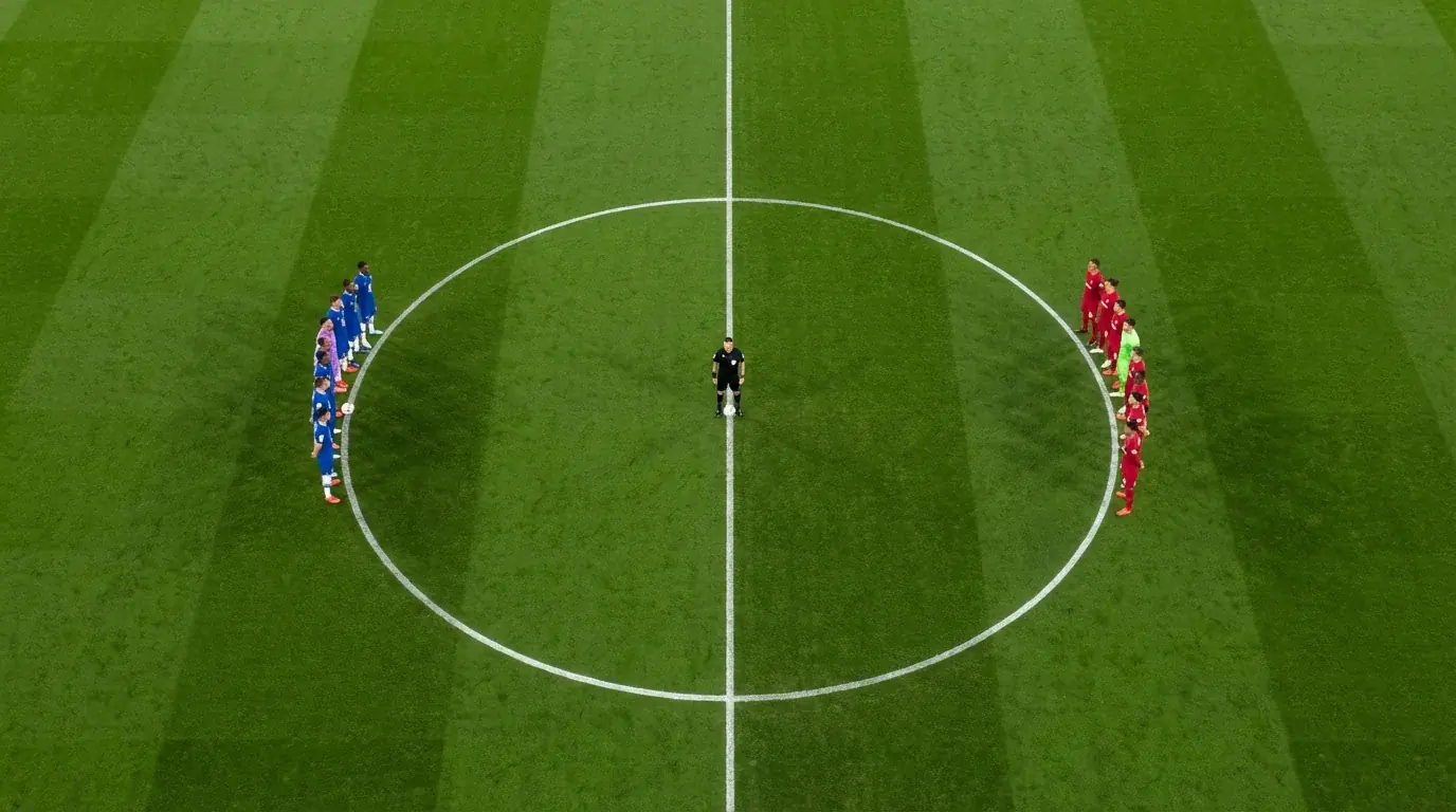 Due squadre di calcio schierate sul campo prima della partita